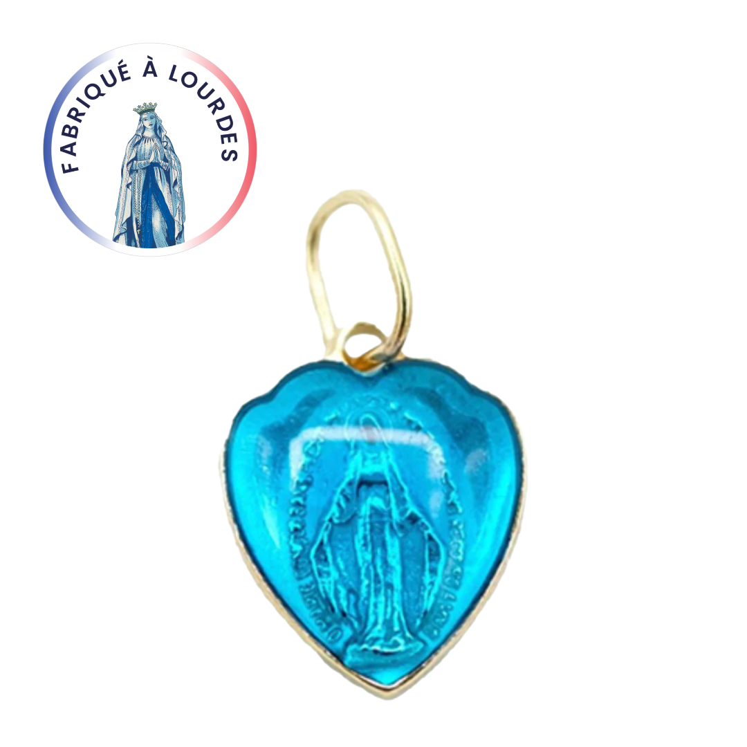 Miraculous medal in the shape of a golden heart