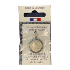 Médaille Vierge de profil en laiton argenté, ronde 17,5 mm, facettée contenant de l'eau de Lourdes