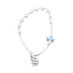 Bracelet imitation perle bleue plus colombe sur chaine